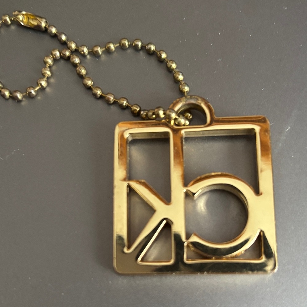 Calvin Klein gold-tone CK Logo Bag Charm - Picture 3 of 3